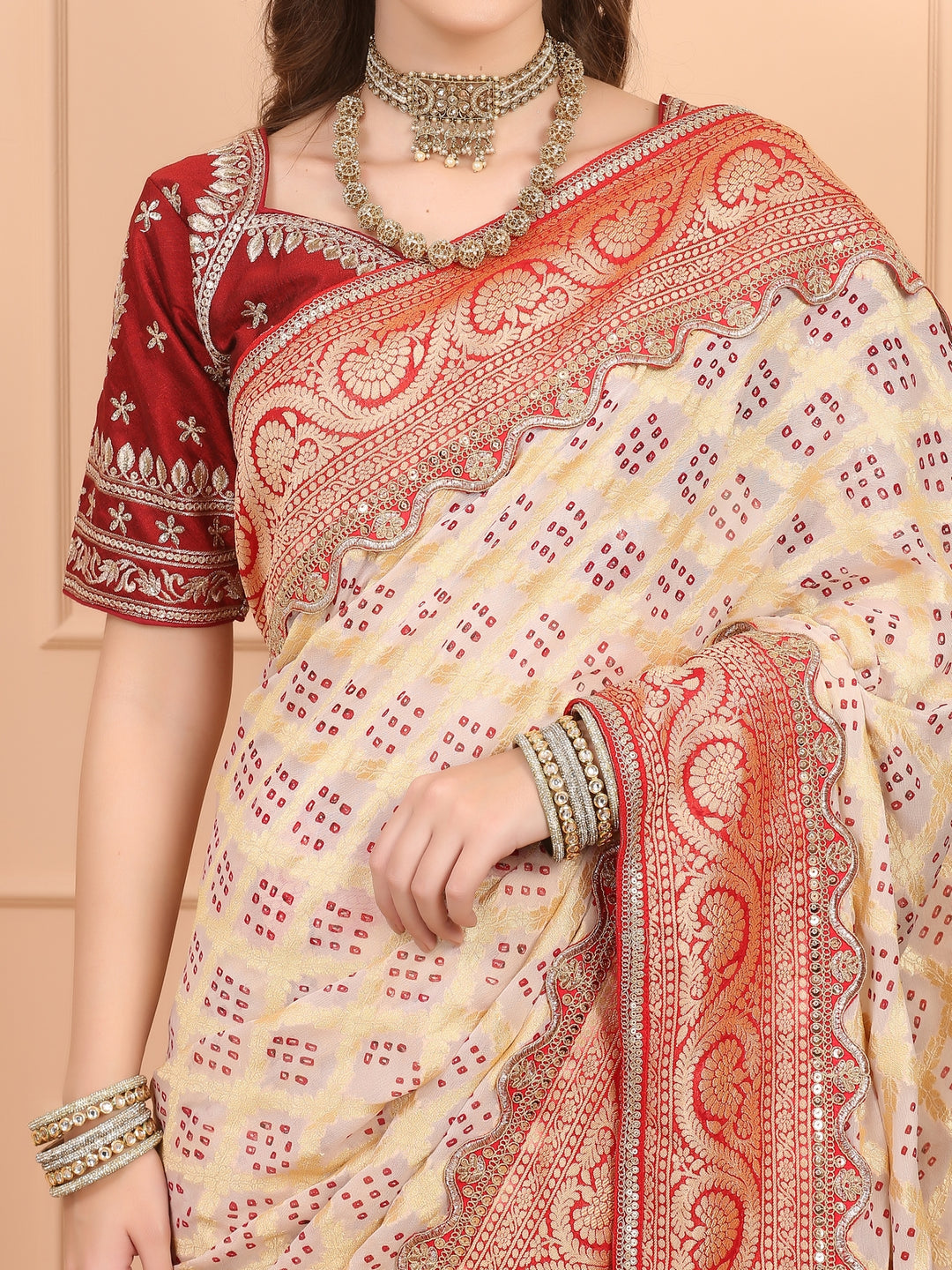 Beige and Red Khaddi Georgette Bandhej Saree