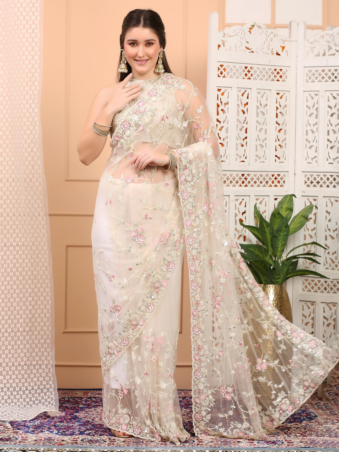 white floral net saree