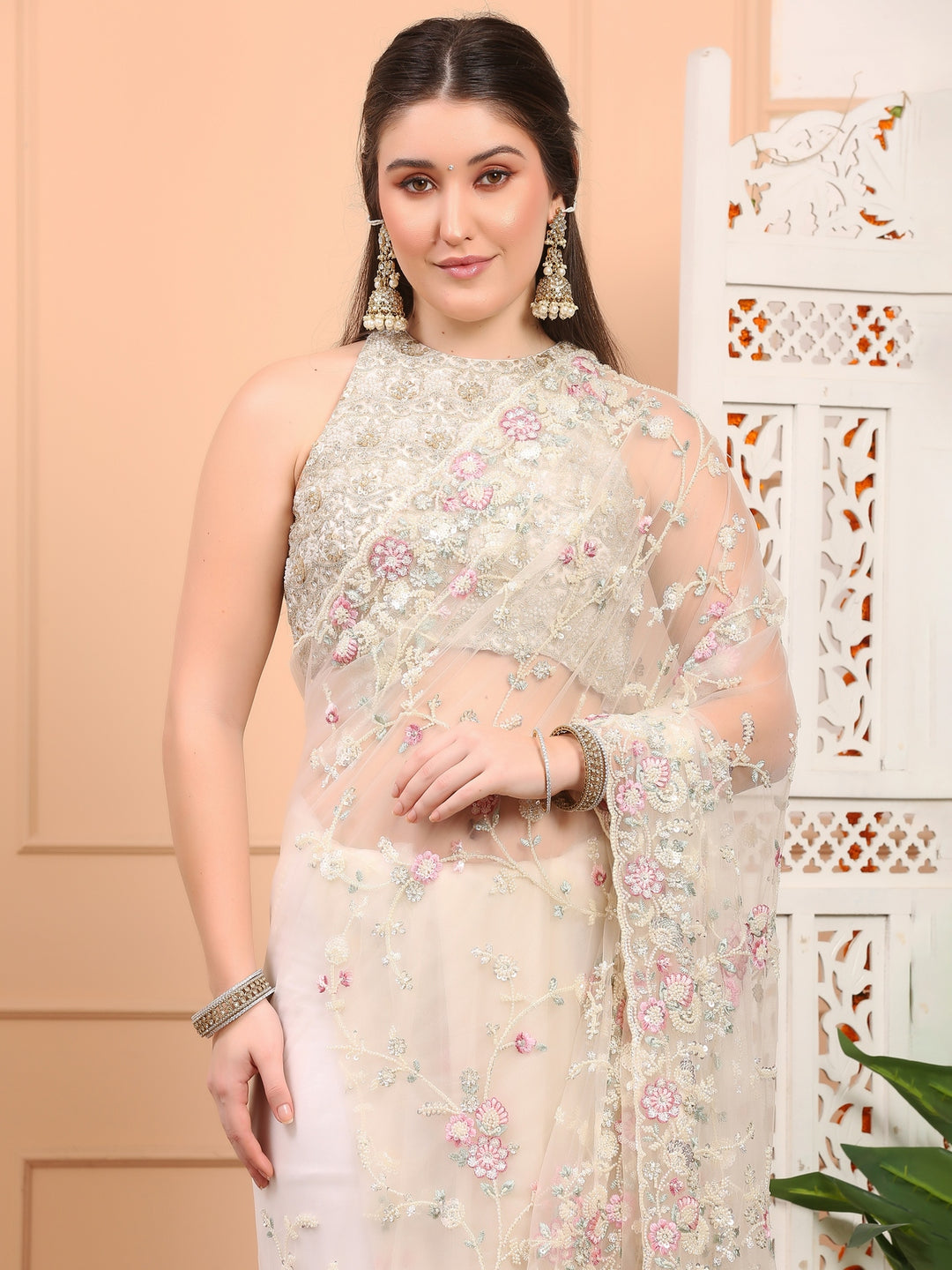 white floral net saree