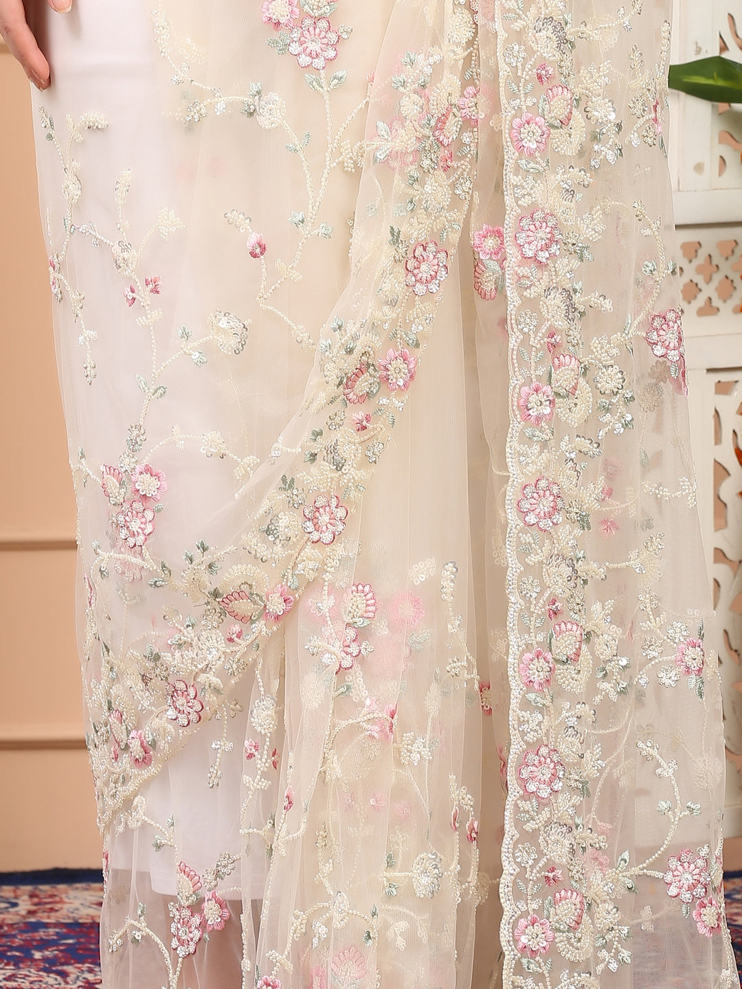 white floral net saree
